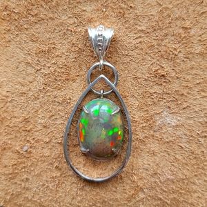 100% Genuine Ethiopian black opal pendant set in SS